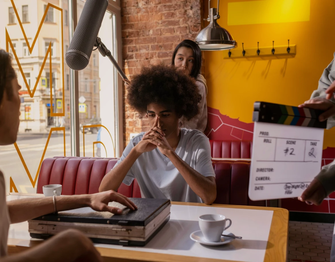 a model trying to act like he is focusing while sitting