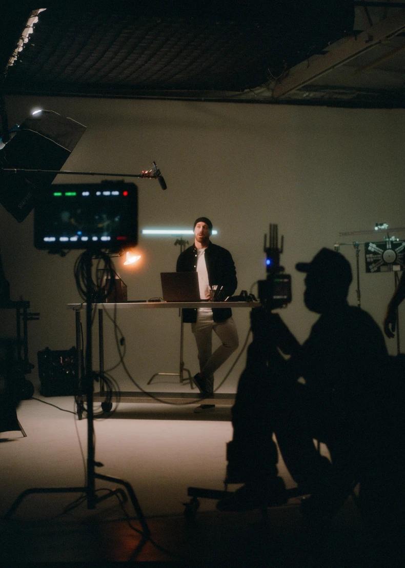 a group of people recording a video inside the studio