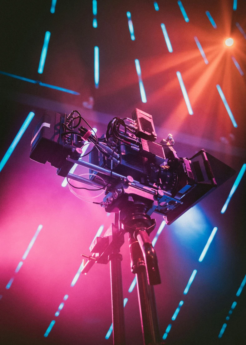 a abstract display of camera with a glow of colors in the background